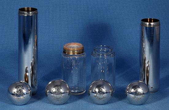 Four late Victorian dressing table cylindrical jars, tallest 176mm. Weight of silver 10.4oz/325 grams.